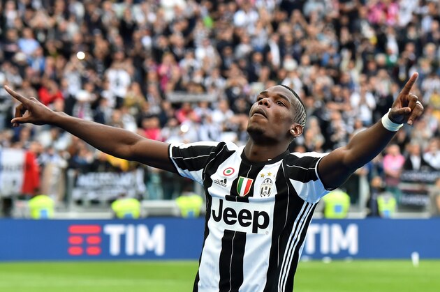 Juventus' midfielder Paul Pogba from France celebrates after the Italian Serie A football match Juventus vs Sampdoria on May 14, 2016 at the 'Juventus Stadium' in Turin. Juventus celebrate a record-equalling fifth consecutive Serie A title. / AFP / GIUSEPPE CACACE        (Photo credit should read GIUSEPPE CACACE/AFP/Getty Images)