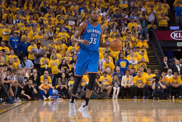 May 30, 2016; Oakland, CA, USA; Oklahoma City Thunder forward Kevin Durant (35) dribbles the basketball during the third quarter in game seven of the Western conference finals of the NBA Playoffs against the Golden State Warriors at Oracle Arena. The Warriors defeated the Thunder 96-88. Mandatory Credit: Kyle Terada-USA TODAY Sports