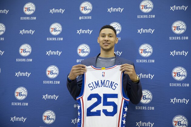 Philadelphia 76ers NBA basketball draft pick Ben Simmons poses for photographs during a news conference in Philadelphia, Friday, June 24, 2016. (AP Photo/Matt Rourke)