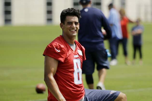 Tennessee Titans quarterback Marcus Mariota (8) stretches during an NFL football practice Wednesday, June 1, 2016, in Nashville, Tenn. (AP Photo/Mark Humphrey)