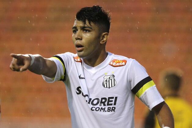 In this Jan. 21, 2014 photo, Santos' Gabriel Barbosa reacts during a Campeonato Paulista soccer game at Pacaembu stadium, in Sao Paulo, Brazil. Santos striker Gabriel Barbosa doesn’t like the comparison, but Brazilians see him as the next Neymar. How’s that for pressure? The 19-year-old Barbosa, who is known universally as “Gabigol,” is ranked as Brazil’s most promising player. (AP Photo/Nelson Antoine)