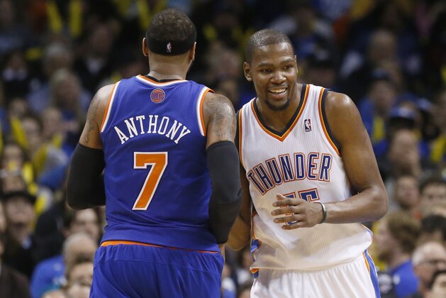 Oklahoma City Thunder forward Kevin Durant (35) laughs as he talks with New York Knicks forward Carmelo Anthony (7) during an NBA basketball game in Oklahoma City, Sunday, Feb. 9, 2014. Oklahoma City won 112-100. (AP Photo/Sue Ogrocki)
