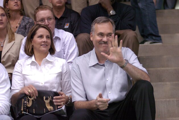 TREVISO, ITALY - OCTOBER 1:  Mike D'Antoni, the Head Coach of the Phoenix Suns, acknowledges the crowd while in attendance with his wife, Laurel, at the start of the Supercopa Championship basketball game between Treviso Benetton and Napoli on October 1, 2006 at Palaverde in Treviso, Italy. D'Antoni, who brought two championships to Treviso was honored at the start of the game. The Suns are conducting preseason workouts in Treviso as part of the NBA Europe Live Tour 2006.  NOTE TO USER: User expressly acknowledges and agrees that, by downloading and/or using this photograph, user is consenting to the terms and conditions of the Getty Images License Agreement.  Mandatory Copyright Notice: Copyright 2006 NBAE (Photo by Randy Belice/NBAE via Getty Images)