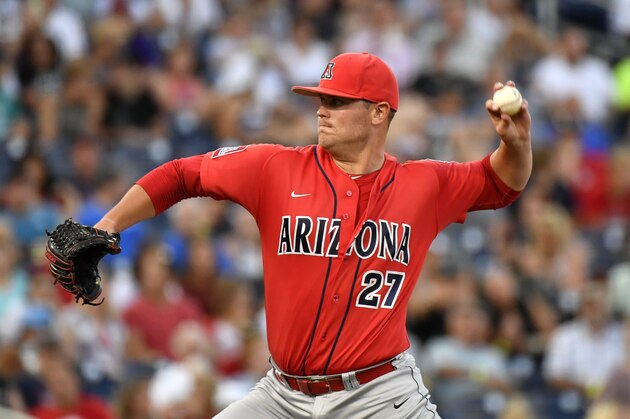 Arizona pitcher JC Cloney throws against Coastal Carolina in the eighth inning in Game 1 of the NCAA Men's College World Series finals baseball game in Omaha, Neb., Monday, June 27, 2016. (AP Photo/Ted Kirk)
