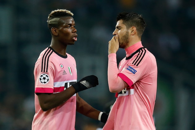 MOENCHENGLADBACH, GERMANY - NOVEMBER 03:  Paul Pogba of Juventus reacts with Alvaro Morata during the UEFA Champions League Group D match between VfL Borussia Monchengladbach and Juventus Turin at Borussia Park on November 3, 2015 in Moenchengladbach, Germany.  (Photo by Boris Streubel/Getty Images)