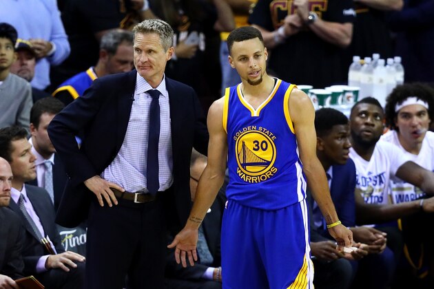 CLEVELAND, OH - JUNE 16: Steve Kerr of the Golden State Warriors and Stephen Curry #30 react in the second half against the Cleveland Cavaliers in Game 6 of the 2016 NBA Finals at Quicken Loans Arena on June 16, 2016 in Cleveland, Ohio. NOTE TO USER: User expressly acknowledges and agrees that, by downloading and or using this photograph, User is consenting to the terms and conditions of the Getty Images License Agreement.  (Photo by Ezra Shaw/Getty Images)
