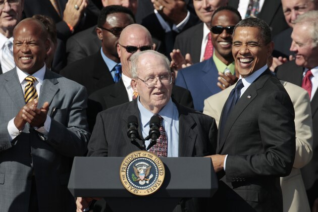 President Barack Obama, right, smiles at defensive cordinator Buddy Ryan, center, as he stands with the 1985 Super Bowl XX Champions Chicago Bears football team during a ceremony on the South Lawn of the White House in Washington, Friday, Oct. 7, 2011.(AP Photo/Pablo Martinez Monsivais)
