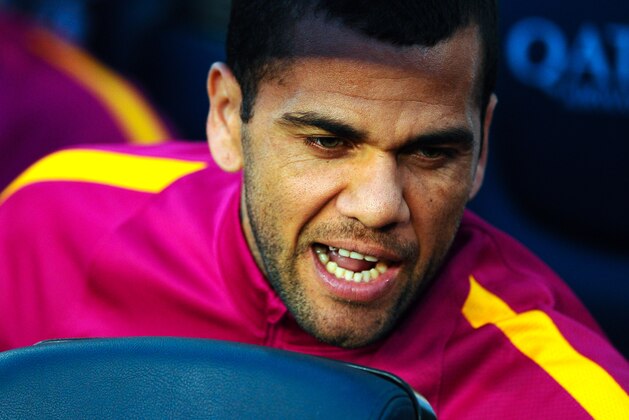 BARCELONA, SPAIN - APRIL 17:  Dani Alves of FC Barcelona looks on from the bench during the La Liga match between FC Barcelona and Valencia CF at Camp Nou on April 17, 2016 in Barcelona, Spain.  (Photo by David Ramos/Getty Images)