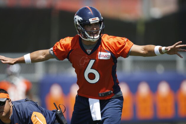 Denver Broncos quarterback Mark Sanchez calls a play before taking the snap during an NFL football practice at the team's headquarters Tuesday, June 7, 2016, in Englewood, Colo. (AP Photo/David Zalubowski)