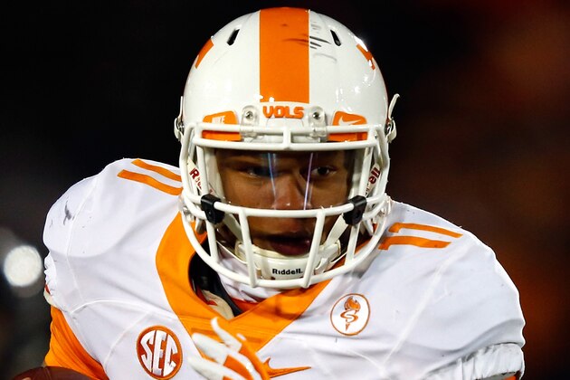 COLUMBIA, MO - NOVEMBER 21:  Quarterback Joshua Dobbs #11 of the Tennessee Volunteers carries the ball during the game against the Missouri Tigers at Faurot Field/Memorial Stadium on November 21, 2015 in Columbia, Missouri.  (Photo by Jamie Squire/Getty Images)