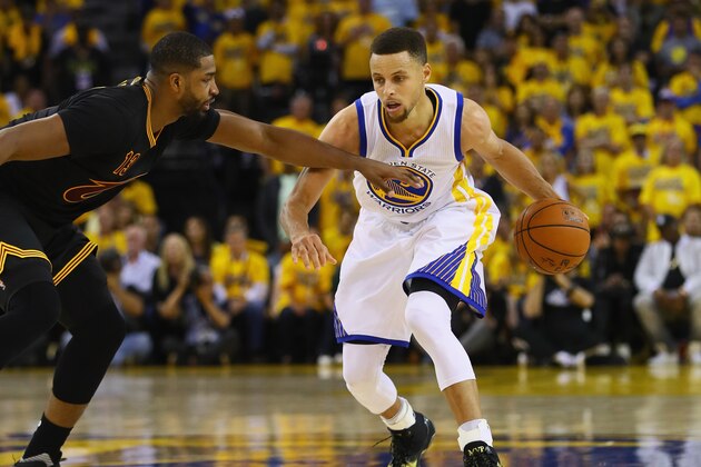OAKLAND, CA - JUNE 19:  Stephen Curry #30 of the Golden State Warriors handles the ball against Tristan Thompson #13 of the Cleveland Cavaliers in Game 7 of the 2016 NBA Finals at ORACLE Arena on June 19, 2016 in Oakland, California. NOTE TO USER: User expressly acknowledges and agrees that, by downloading and or using this photograph, User is consenting to the terms and conditions of the Getty Images License Agreement.  (Photo by Ezra Shaw/Getty Images)