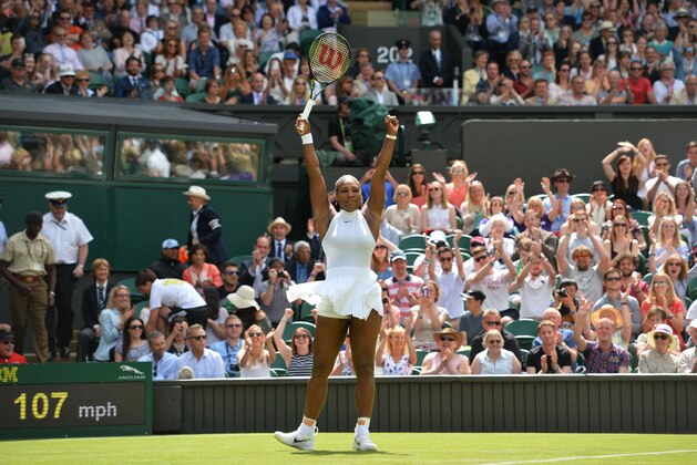 US player Serena Williams celebrates beating Switzerland's Amra Sadikovic during their women's singles first round match on the second day of the 2016 Wimbledon Championships at The All England Lawn Tennis Club in Wimbledon, southwest London, on June 28, 2016. / AFP / GLYN KIRK / RESTRICTED TO EDITORIAL USE        (Photo credit should read GLYN KIRK/AFP/Getty Images)