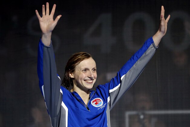 Jun 27, 2016; Omaha, NE, USA; Katie Ledecky celebrates after winning the women's freestyle 400m final in the U.S. Olympic swimming team trials at CenturyLink Center. Mandatory Credit: Erich Schlegel-USA TODAY Sports