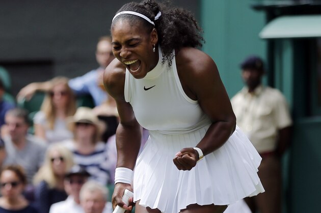 Serena Williams of the U.S celebrates a point against Amara Safikovic of Switzerland during their women's singles match on day two of the Wimbledon Tennis Championships in London, Tuesday, June 28, 2016. (AP Photo/Ben Curtis)