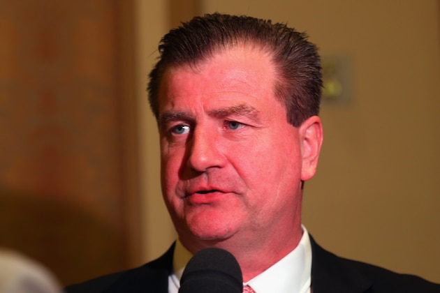 LAS VEGAS, NV - JUNE 23:  General manager Jim Benning of the Vancouver Canucks speaks with the media following the NHL general managers meetings at the Bellagio Las Vegas on June 23, 2015 in Las Vegas, Nevada.  (Photo by Bruce Bennett/Getty Images)