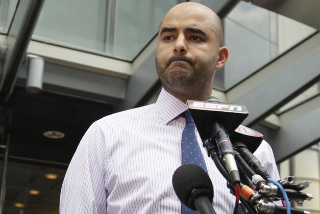 NFL Players Association spokesman George Atallah pauses as he speaks to media in Washington, Monday, July 18, 2011, as talks to end the NFL lockout continued. (AP Photo/Carolyn Kaster)