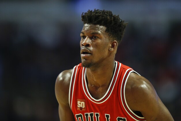 Chicago Bulls guard Jimmy Butler looks on against the Philadelphia 76ers during the first half of an NBA basketball game, Wednesday, April 13, 2016 in Chicago. (AP Photo/Kamil Krzaczynski)