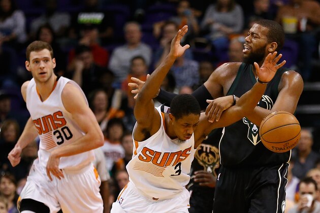 PHOENIX, AZ - DECEMBER 20:  Brandon Knight #3 of the Phoenix Suns collides with Greg Monroe #15 of the Milwaukee Bucks during the second half of the NBA game at Talking Stick Resort Arena on December 20, 2015 in Phoenix, Arizona.   The Bucks defeated the Suns 101-95. NOTE TO USER: User expressly acknowledges and agrees that, by downloading and or using this photograph, User is consenting to the terms and conditions of the Getty Images License Agreement.  (Photo by Christian Petersen/Getty Images)