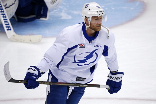 FILE - In a Sunday May 15, 2016 file photo, Tampa Bay Lightning's Steven Stamkos skates during hockey practice at the Consol Energy Center in Pittsburgh. With the NHL draft weekend out of the way, let the Stamkos free-agency watch begin. The Buffalo Sabres are interested, as are Toronto, Detroit and Vancouver, in the Tampa Bay Lightning captain who is eligible to become a free agent on July 1.  (AP Photo/Gene J. Puskar, File)