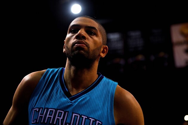 MIAMI, FL - APRIL 17: Nicolas Batum #5 of the Charlotte Hornets  looks on during Game One of the Eastern Conference Quarterfinals against the Miami Heat during the 2016 NBA Playoffs  at American Airlines Arena on April 17, 2016 in Miami, Florida. NOTE TO USER: User expressly acknowledges and agrees that, by downloading and or using this photograph, User is consenting to the terms and conditions of the Getty Images License Agreement.  (Photo by Mike Ehrmann/Getty Images)