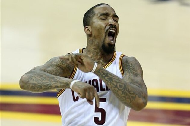 Cleveland Cavaliers guard J.R. Smith (5) celebrates a basket against the Golden State Warriors during the second half of Game 6 of basketball's NBA Finals in Cleveland, Thursday, June 16, 2016. (AP Photo/Ron Schwane)