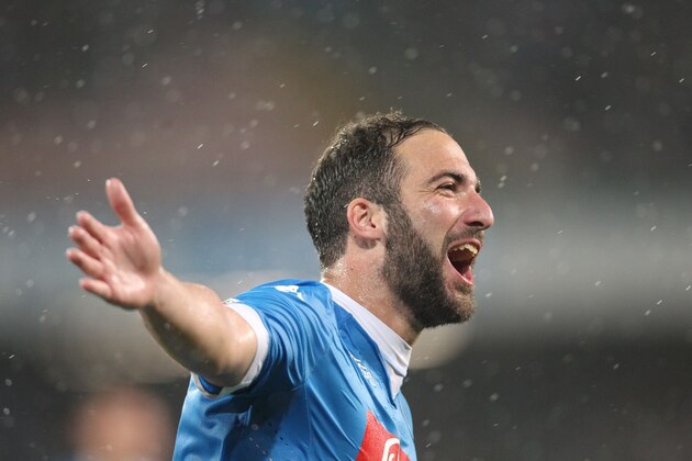 Napoli's Argentinian-French forward Gonzalo Higuain celebrates after scoring his 36th goal in the season during the Italian Serie A football match SSC Napoli vs Frosinone Calcio on May 14 2016 at the San Paolo stadium in Naples.
Higuain breaks the italian record of 35 scores estabilished in 1949-50 season by Ac Milan's Swedish forward Gunnar Nordahl. / AFP / CARLO HERMANN        (Photo credit should read CARLO HERMANN/AFP/Getty Images)