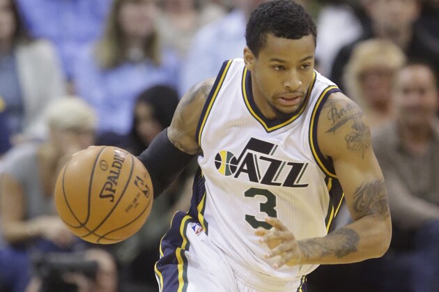 Utah Jazz guard Trey Burke (3) brings the ball up court during the second half of an NBA basketball game against the Portland Trail Blazers Thursday, Dec. 31, 2015, in Salt Lake City. The Jazz won 109-96. (AP Photo/Rick Bowmer)