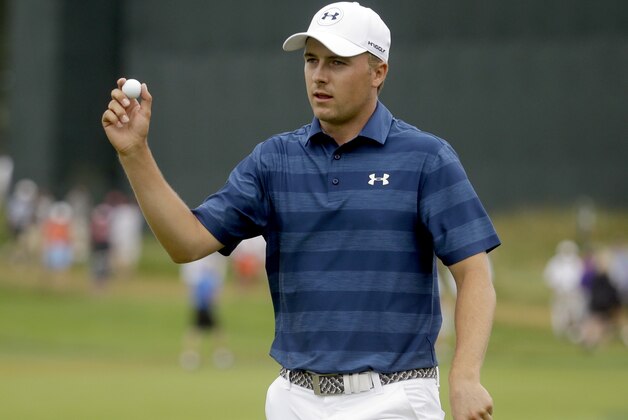 Jordan Spieth waves on the 15th hole during the first round of the U.S. Open golf championship at Oakmont Country Club on Thursday, June 16, 2016, in Oakmont, Pa. (AP Photo/John Minchillo)