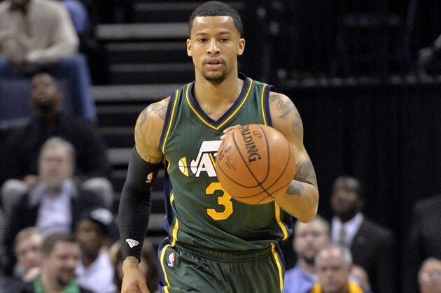 Utah Jazz guard Trey Burke (3) plays in the second half of an NBA basketball game Friday, March 4, 2016, in Memphis, Tenn. (AP Photo/Brandon Dill)