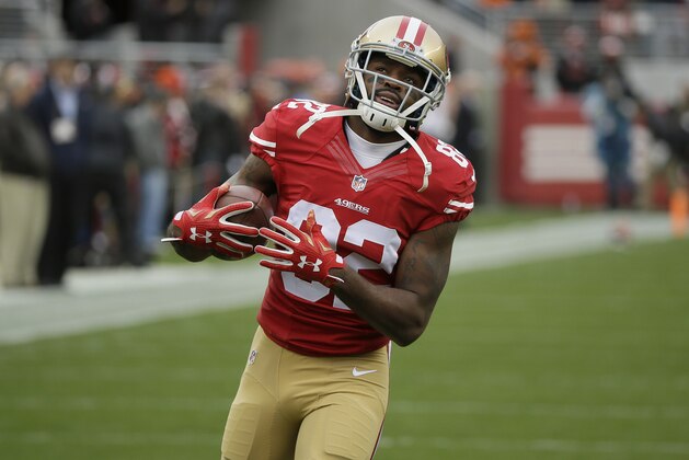 San Francisco 49ers wide receiver Torrey Smith (82) warms up before an NFL football game against the Cincinnati Bengals in Santa Clara, Calif., Sunday, Dec. 20, 2015. (AP Photo/Eric Risberg)