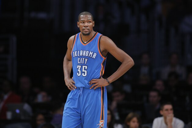 Oklahoma City Thunder's Kevin Durant stands on the court during the first half of an NBA basketball game against the Los Angeles Lakers, Wednesday, Dec. 23, 2015, in Los Angeles. (AP Photo/Jae C. Hong)
