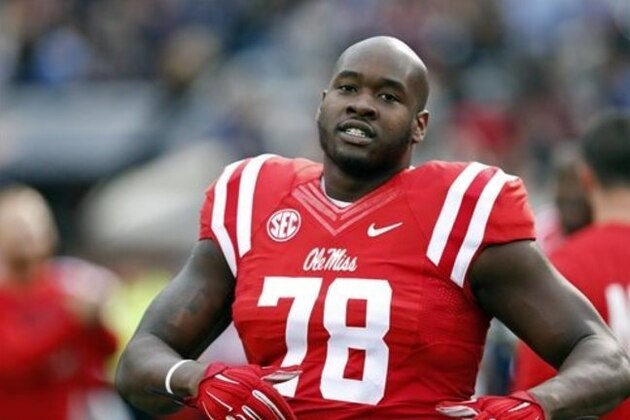 FILE - In this Oct. 24, 2015 file photo, Mississippi offensive lineman Laremy Tunsil (78) loosens up prior to his team's NCAA college football game against Texas A&M in Oxford, Miss. Mississippi will investigate former offensive lineman Laremy Tunsil's comments that he accepted money from a member of the football staff while playing at the school. The university said in a statement Friday, April 29, 2016, it is