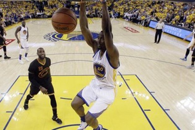 Golden State Warriors' Harrison Barnes (40) dunks past Cleveland Cavaliers' LeBron James (23) during the second half in Game 7 of basketball's NBA Finals Sunday, June 19, 2016, in Oakland, Calif. (AP Photo/Marcio Jose Sanchez)