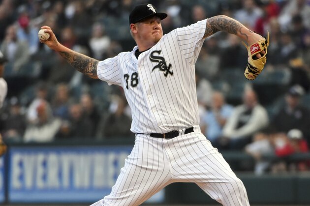 Chicago White Sox's starting pitcher Mat Latos delivers against the Washington Nationals during the first inning of a baseball game in Chicago on Tuesday, June 7, 2016. (AP Photo/Matt Marton)