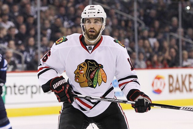 WINNIPEG, MB - MARCH 18: Andrew Ladd #16 of the Chicago Blackhawks skates down the ice in second period action in an NHL game against the Winnipeg Jets at the MTS Centre on March 18, 2016 in Winnipeg, Manitoba, Canada. (Photo by Marianne Helm/Getty Images)
