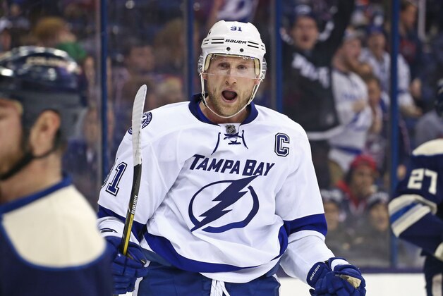 Mar 13, 2016; Columbus, OH, USA; Tampa Bay Lightning center Steven Stamkos (91) reacts to the shorthanded goal scored by left wing Ondrej Palat (18) in the third period at Nationwide Arena. The Lightning won 4-0. Mandatory Credit: Aaron Doster-USA TODAY Sports