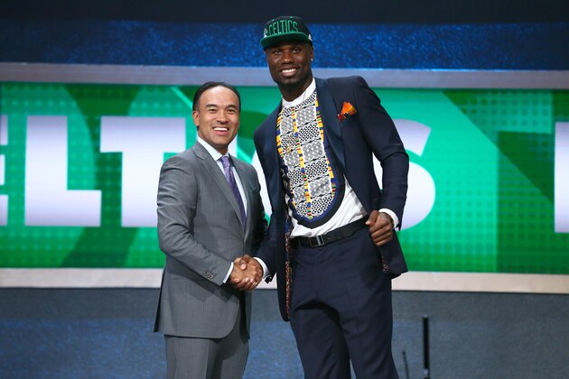 BROOKLYN, NY - JUNE 23: Ben Bentil shakes hands with NBA Deputy Commissioner and Chief Operating Officer, Mark Tatum after being selected number fifty one overall by the Boston Celtics during the 2016 NBA Draft on June 23, 2015 at Barclays Center in Brooklyn, New York. NOTE TO USER: User expressly acknowledges and agrees that, by downloading and or using this photograph, User is consenting to the terms and conditions of the Getty Images License Agreement. Mandatory Copyright Notice: Copyright 2016 NBAE (Photo by Nathaniel S. Butler /NBAE via Getty Images)
