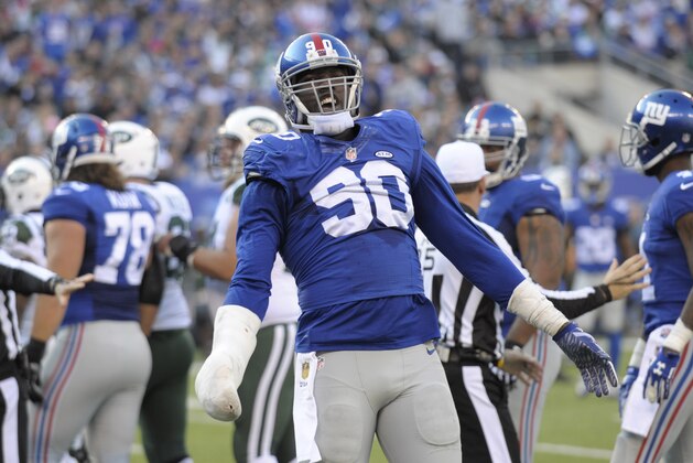 New York Giants defensive end Jason Pierre-Paul reacts during the first half of an NFL football game against the New York Jets Sunday, Dec. 6, 2015, in East Rutherford, N.J. (AP Photo/Bill Kostroun)