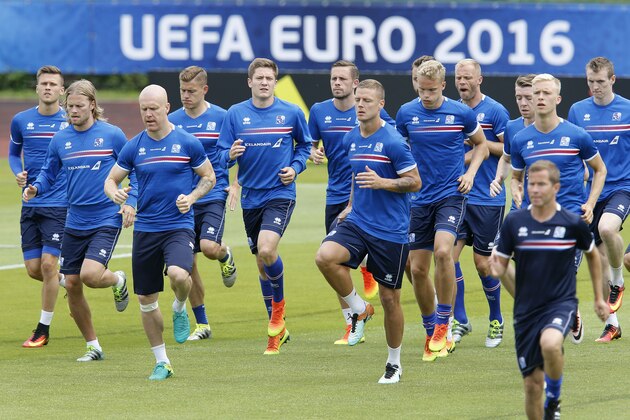 Players attend a training session of Iceland's national soccer team at their base camp in Annecy, France, Thursday, June 30, 2016. Iceland will face France in a Euro 2016 quarterfinal match in Paris on Sunday, July 3, 2016.(AP Photo/Michael Probst)