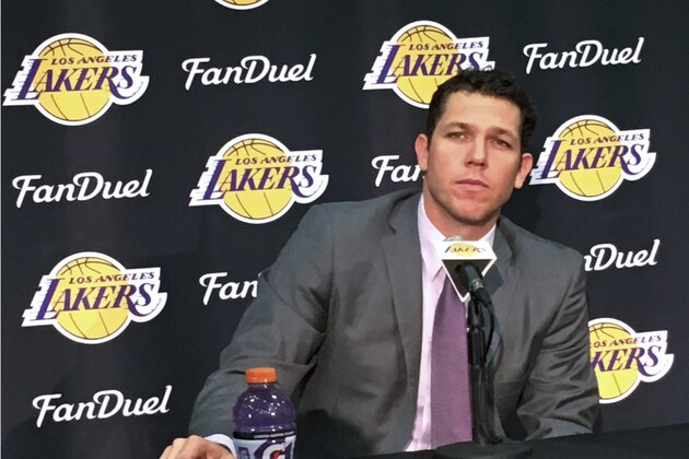 The Los Angeles Lakers' new coach, Luke Walton, takes question during a news conference in El Segundo, Calif., Tuesday, June 21, 2016. Walton knows he's got some catching up to do at his new job. Walton has finally arrived from Golden State, mere days before his downtrodden franchise adds its next big piece in the draft. (AP Photo/Greg Beacham)