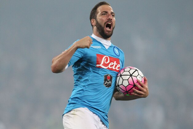 TOPSHOT - Napoli's Argentinian-French forward Gonzalo Higuain celebrates after scoring his third goal during the Italian Serie A football match SSC Napoli vs Frosinone Calcio on May 14 2016 at the San Paolo stadium in Naples.
Napoli won the match 4-0. / AFP / CARLO HERMANN        (Photo credit should read CARLO HERMANN/AFP/Getty Images)