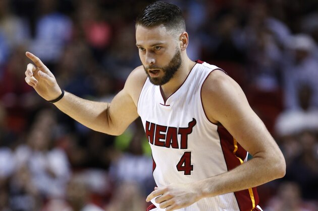 Miami Heat forward Josh McRoberts celebrates after scoring a three-point shot during the first half of an NBA basketball game against the Orlando Magic, Sunday, April 10, 2016, in Miami. (AP Photo/Wilfredo Lee)