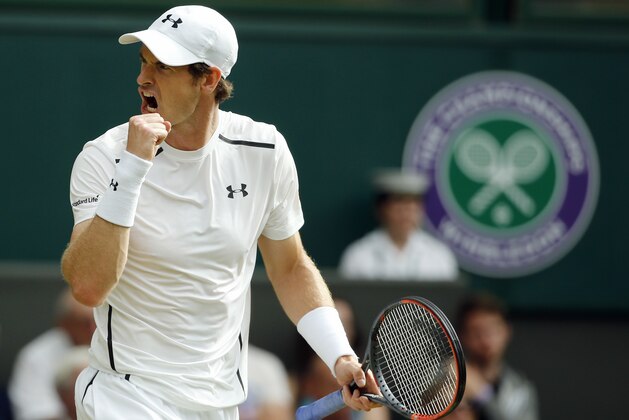 Andy Murray of Britain celebrates a point against Yen-Hsun Lu of Taiwan during their men's singles match on day four of the Wimbledon Tennis Championships in London, Thursday, June 30, 2016. (AP Photo/Alastair Grant)