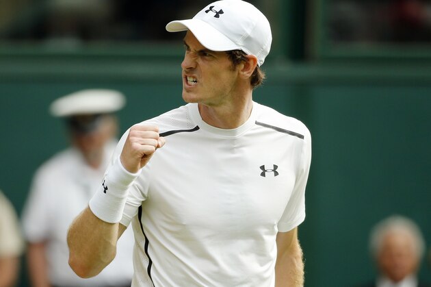 Andy Murray of Britain celebrates after beating Yen-Hsun Lu of Taiwan in their men's singles match on day four of the Wimbledon Tennis Championships in London, Thursday, June 30, 2016. (AP Photo/Alastair Grant)