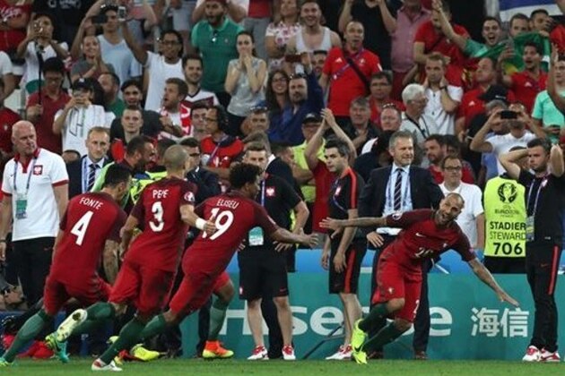 Portugal's Ricardo Quaresma, right, celebrates after scoring the winning penalty during a penalty shootout at the end of the Euro 2016 quarterfinal soccer match between Poland and Portugal, at the Velodrome stadium in Marseille, France, Thursday, June 30, 2016. (AP Photo/Thanassis Stavrakis)