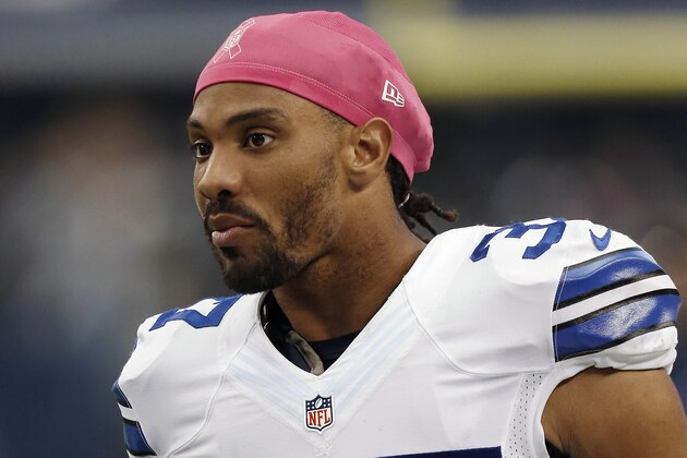 FILE - This Oct. 5, 2014, file photo shows then-Dallas Cowboys defensive back C.J. Spillman (37)  on the sidelines during the first half of an NFL football game against the Houston Texans in Arlington, Texas. Former Cowboys special teams player C.J. Spillman has been arrested on a sexual assault charge in an alleged 2014 incident at a Dallas-area hotel. Tarrant County jail records show Spillman surrendered early Wednesday, July 1, 2015, and was freed on $15,000 bond. (AP Photo/Brandon Wade, File)