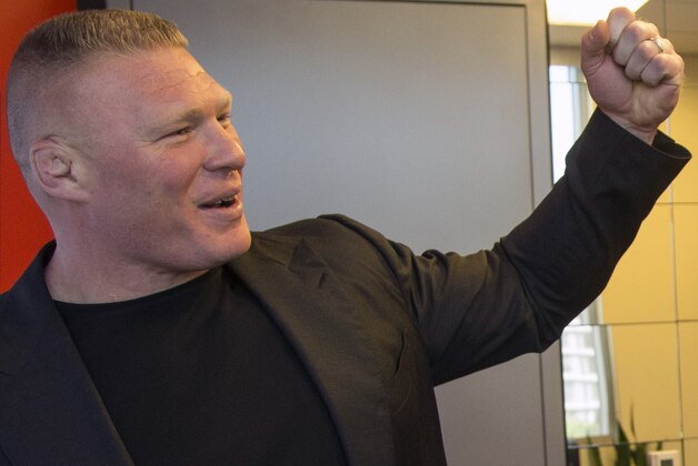 Former UFC heavyweight champion Brock Lesnar pauses for a photo after ruling out a return to mixed martial arts, ending three years of speculation about the biggest pay-per-view star in the sport's history, as he announced he had re-signed with WWE in an interview on ESPN's