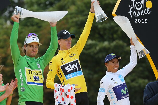 PARIS, FRANCE - JULY 26: Winner of the Tour Chris Froome of Great Britain and Team Sky wearing the yellow jersey and holding the polka dot jersey for best climber is surrounded by Peter Sagan of Slovakia and Tinkoff-Saxo wearing the green jersey for best sprinter (left) and Nairo Quintana of Colombia and Movistar Team wearing the white jersey for best young rider during the trophy ceremony, following stage twenty one of the 2015 Tour de France, a 109.5 km stage from Sevres to the Champs Elysees Avenue in Paris on July 26, 2015 in Paris, France. (Photo by Jean Catuffe/Getty Images) PARIS, FRANCE - JULY 26: Winner of the Tour Chris Froome of Great Britain and Team Sky wearing the yellow jersey and holding the polka dot jersey for best climber is surrounded by Peter Sagan of Slovakia and Tinkoff-Saxo wearing the green jersey for best sprinter (left) and Nairo Quintana of Colombia and Movistar Team wearing the white jersey for best young rider during the trophy ceremony, following stage twenty one of the 2015 Tour de France, a 109.5 km stage from Sevres to the Champs Elysees Avenue in Paris on July 26, 2015 in Paris, France. (Photo by Jean Catuffe/Getty Images)