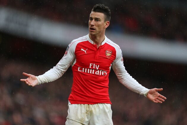 LONDON, ENGLAND - FEBRUARY 20 : Laurent Koscielny of Arsenal shrugs his shoulders during the Emirates FA Cup match between Arsenal and Hull City at the Emirates Stadium on February 20, 2016 in London, England. (Photo by Catherine Ivill - AMA/Getty Images) LONDON, ENGLAND - FEBRUARY 20 : Laurent Koscielny of Arsenal shrugs his shoulders during the Emirates FA Cup match between Arsenal and Hull City at the Emirates Stadium on February 20, 2016 in London, England. (Photo by Catherine Ivill - AMA/Getty Images)