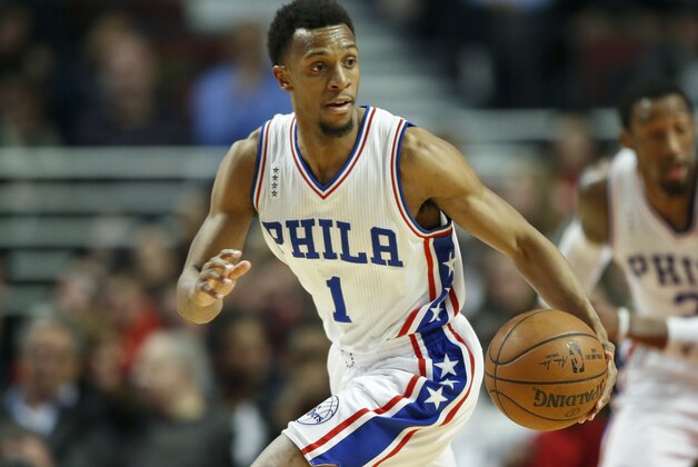 Philadelphia 76ers guard Ish Smith brings the ball up court against the Chicago Bulls during the first half of an NBA basketball game, Wednesday, April 13, 2016 in Chicago. (AP Photo/Kamil Krzaczynski)